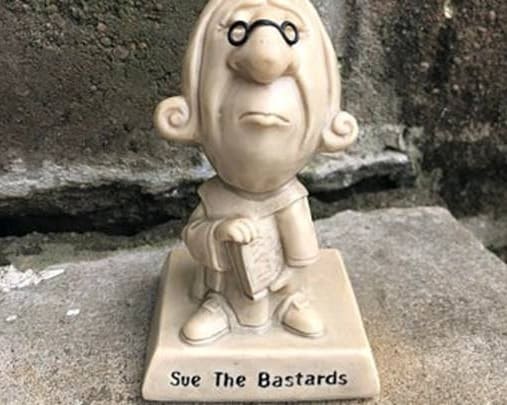 "Sue the Bastards" figurine.