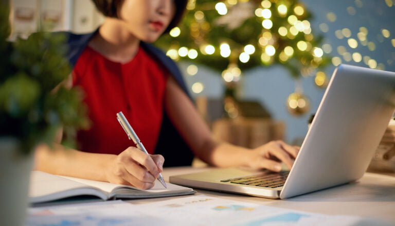 business woman organising legal paperwork at christmas time